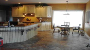 This kitchen and dining area was designed for a family that has 4 kids that use wheelchairs.